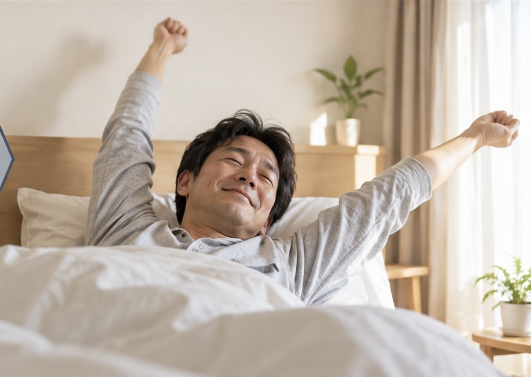 一週間以上ぶりにしっかり眠ることができ翌朝スッキリした40代男性のイメージ