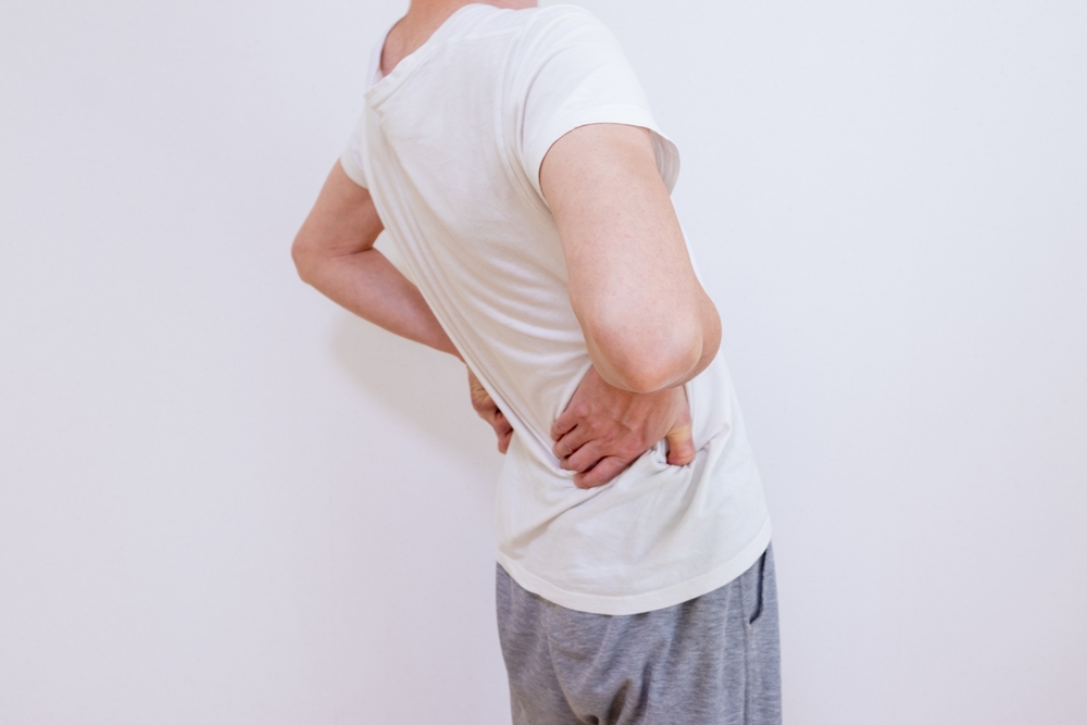 身体を少しひねった時に腰へ負担がかかる様子