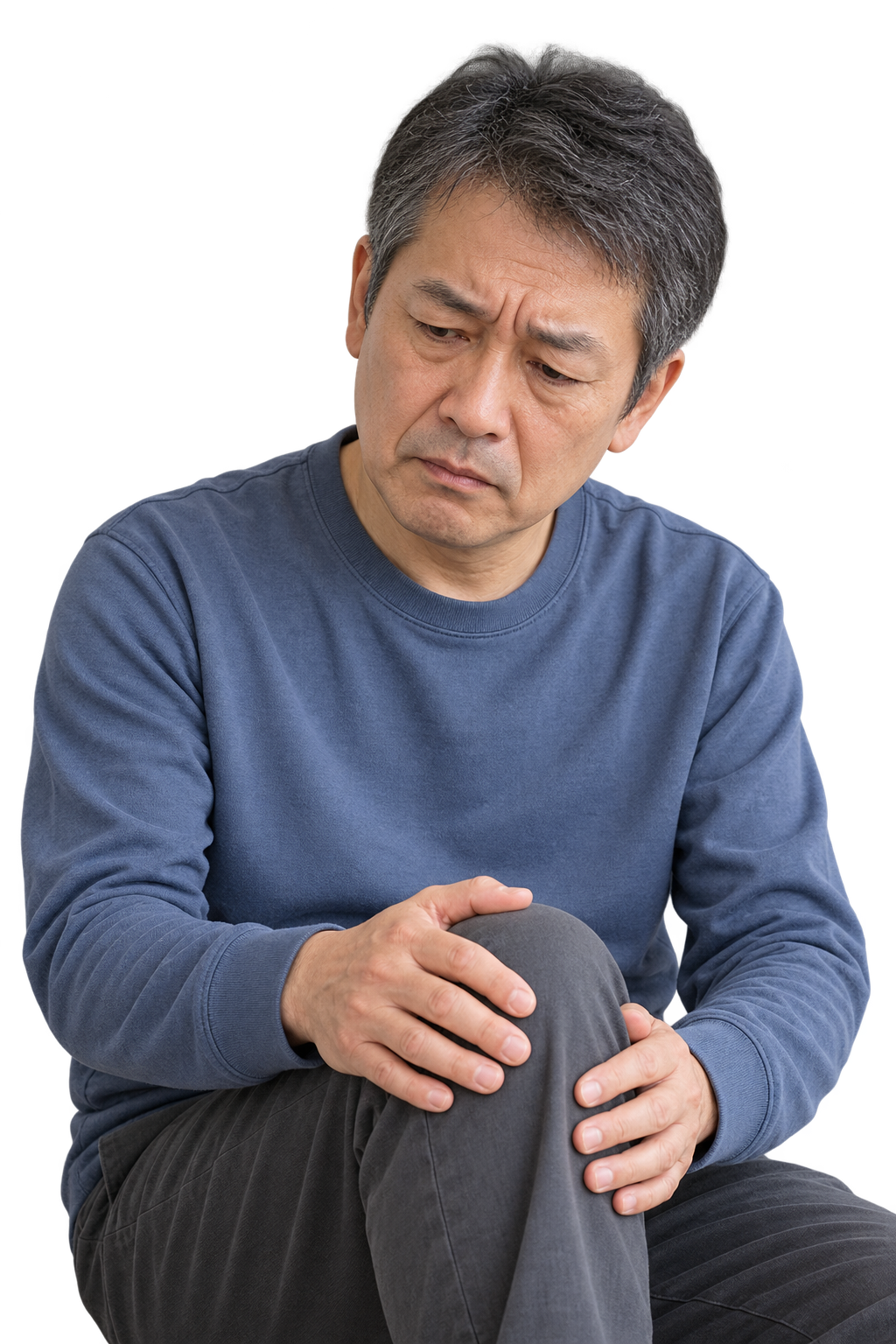 膝の痛みや曲げにくさに不安を感じる52歳男性のイメージ